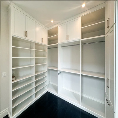 walk-in closet shoe shelves and peninsula drawers storage